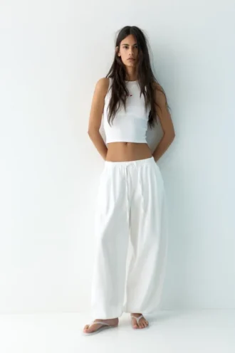 Pantaloni a cavallo basso con elastico in vita