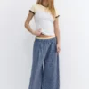Pantaloni a quadri in stile pigiama con pinces Pantaloni a quadri in stile pigiama con pinces