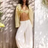 Pantaloni a vita bassa con pinces Pantaloni a vita bassa con pinces