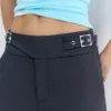 Pantaloni a zampa con fibbia Pantaloni a zampa con fibbia