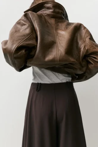 Pantaloni a zampa con pinces