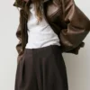 Pantaloni a zampa con pinces Pantaloni a zampa con pinces