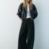 Pantaloni Barrel con pinces Pantaloni Barrel con pinces