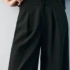 Pantaloni Barrel con pinces Pantaloni Barrel con pinces