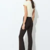 Pantaloni bootcut a vita media Pantaloni bootcut a vita media