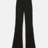 Pantaloni bootcut a vita media Pantaloni bootcut a vita media