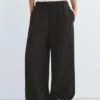 Pantaloni da tuta a gamba larga con orlo regolabile Pantaloni da tuta a gamba larga con orlo regolabile