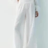Pantaloni fluidi effetto garza Pantaloni fluidi effetto garza