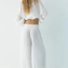 Pantaloni fluidi effetto garza Pantaloni fluidi effetto garza