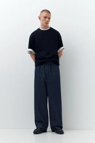 Pantaloni jogger in denim a righe