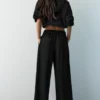 Pantaloni sartoriali con pinces Pantaloni sartoriali con pinces
