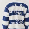 Polo a righe con ricamo di ciclista Polo a righe con ricamo di ciclista