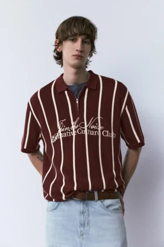 Polo in maglia a righe con cerniera