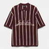 Polo in maglia a righe con cerniera Polo in maglia a righe con cerniera