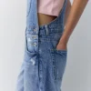 Salopette lunga in denim Salopette lunga in denim
