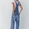 Salopette lunga in denim Salopette lunga in denim