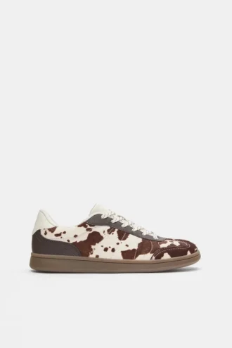 Sneakers in pelle con stampa bovina
