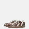 Sneakers in pelle con stampa bovina Sneakers in pelle con stampa bovina