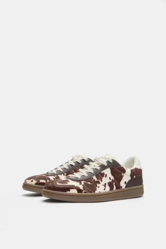 Sneakers in pelle con stampa bovina
