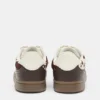 Sneakers in pelle con stampa bovina Sneakers in pelle con stampa bovina