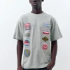 T-shirt a maniche corte con toppe T-shirt a maniche corte con toppe