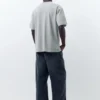 T-shirt a maniche corte con toppe T-shirt a maniche corte con toppe