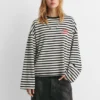 T-shirt a righe con scritta T-shirt a righe con scritta