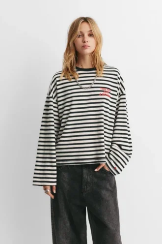 T-shirt a righe con scritta