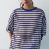 T-shirt a righe con scritta T-shirt a righe con scritta