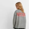 T-shirt a righe con scritta T-shirt a righe con scritta