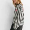 T-shirt a righe con scritta T-shirt a righe con scritta