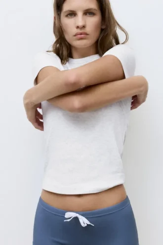T-shirt aderente a maniche corte