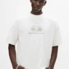 T-shirt bianca con grafica a riccio T-shirt bianca con grafica a riccio
