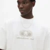 T-shirt bianca con grafica a riccio T-shirt bianca con grafica a riccio