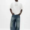 T-shirt bianca con grafica a riccio T-shirt bianca con grafica a riccio