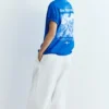 T-shirt blu con grafica e slogan T-shirt blu con grafica e slogan