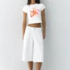 T-shirt con grafica floreale T-shirt con grafica floreale