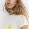 T-shirt con grafica floreale T-shirt con grafica floreale