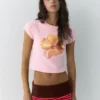 T-shirt rosa con grafica floreale T-shirt rosa con grafica floreale