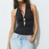 Top all’americana con dettagli metallici Top all’americana con dettagli metallici