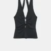 Top all’americana con dettagli metallici Top all’americana con dettagli metallici