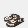 Zoccoli in pelle con stampa mucca STWD Zoccoli in pelle con stampa mucca STWD